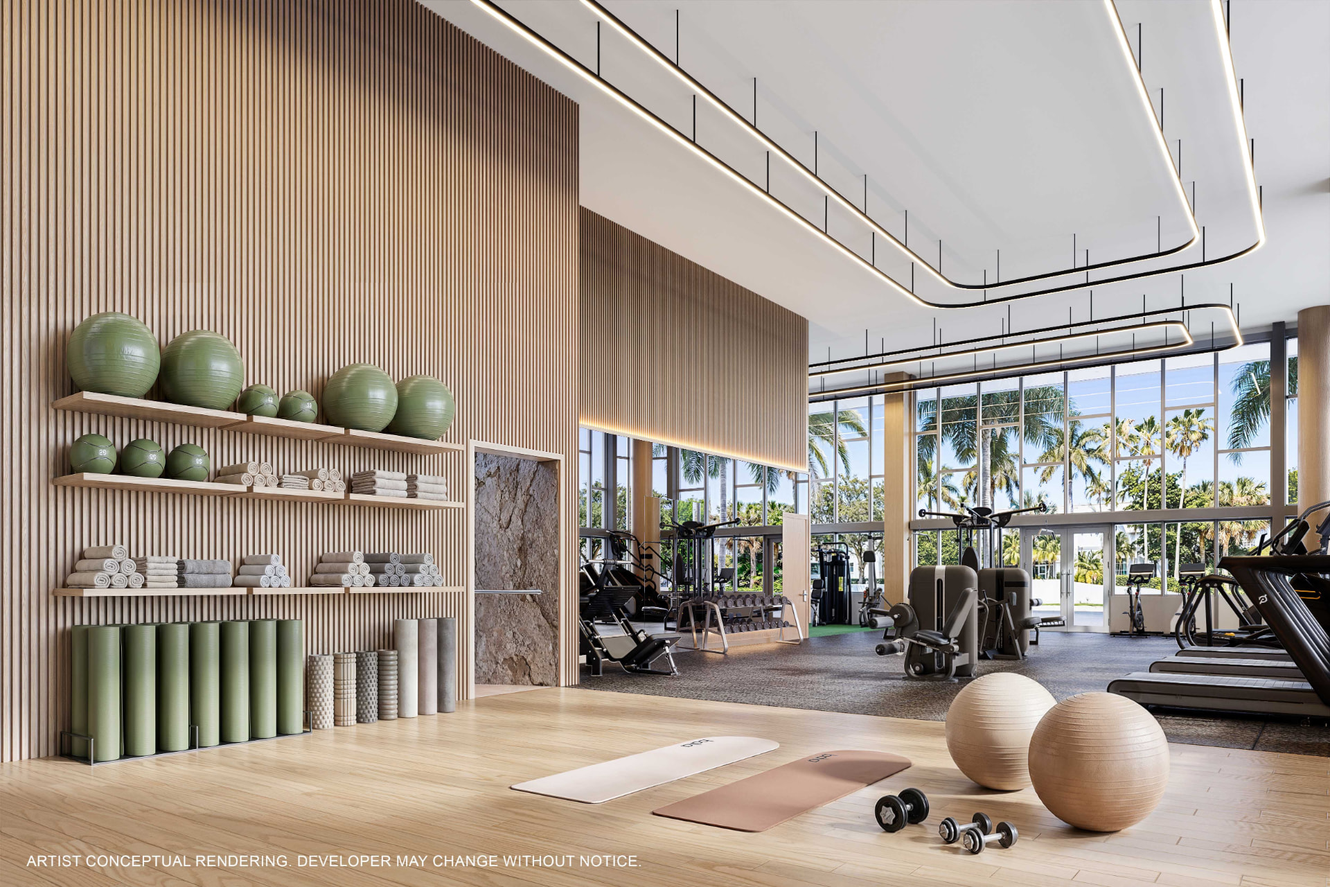 Fitness center com equipamentos e vista para o mar