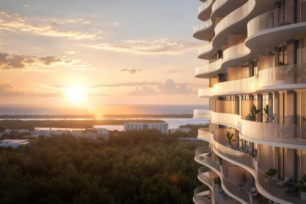 Varandas da Beach House ao pôr do sol, com a lagoa ao fundo