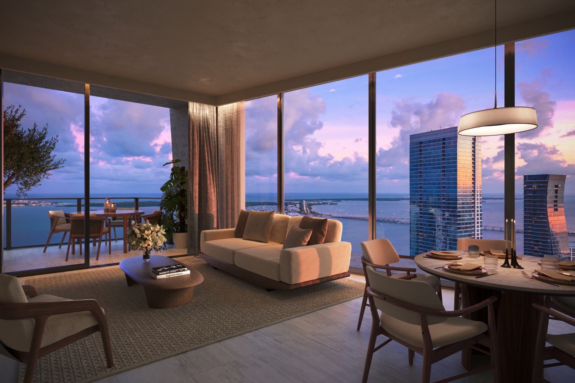 Living com jantar e vista panorâmica ao entardecer no ORA by Casa Tua
